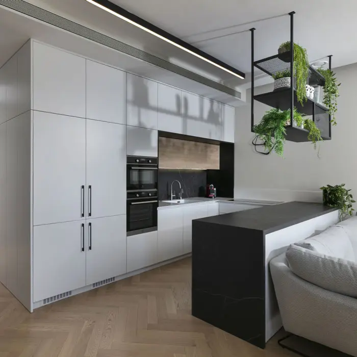 מטבח מודרני עם אי שחור, נגרות לבנה ותכנון נקי של החלל